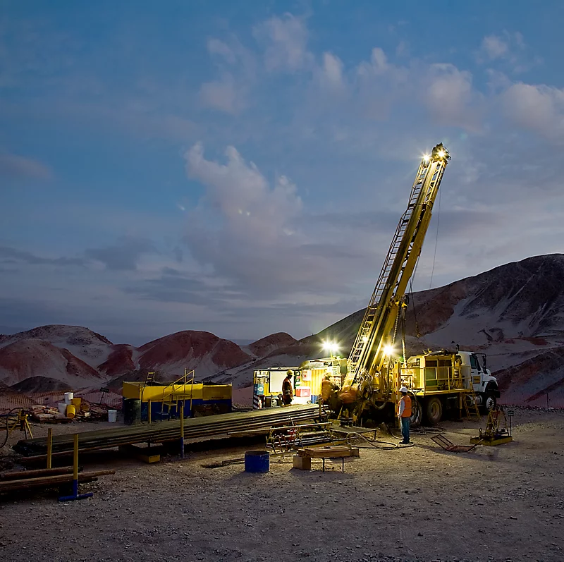 Field image from Rare Earths Labrador showing site inspection or exploration activity in a natural mining area